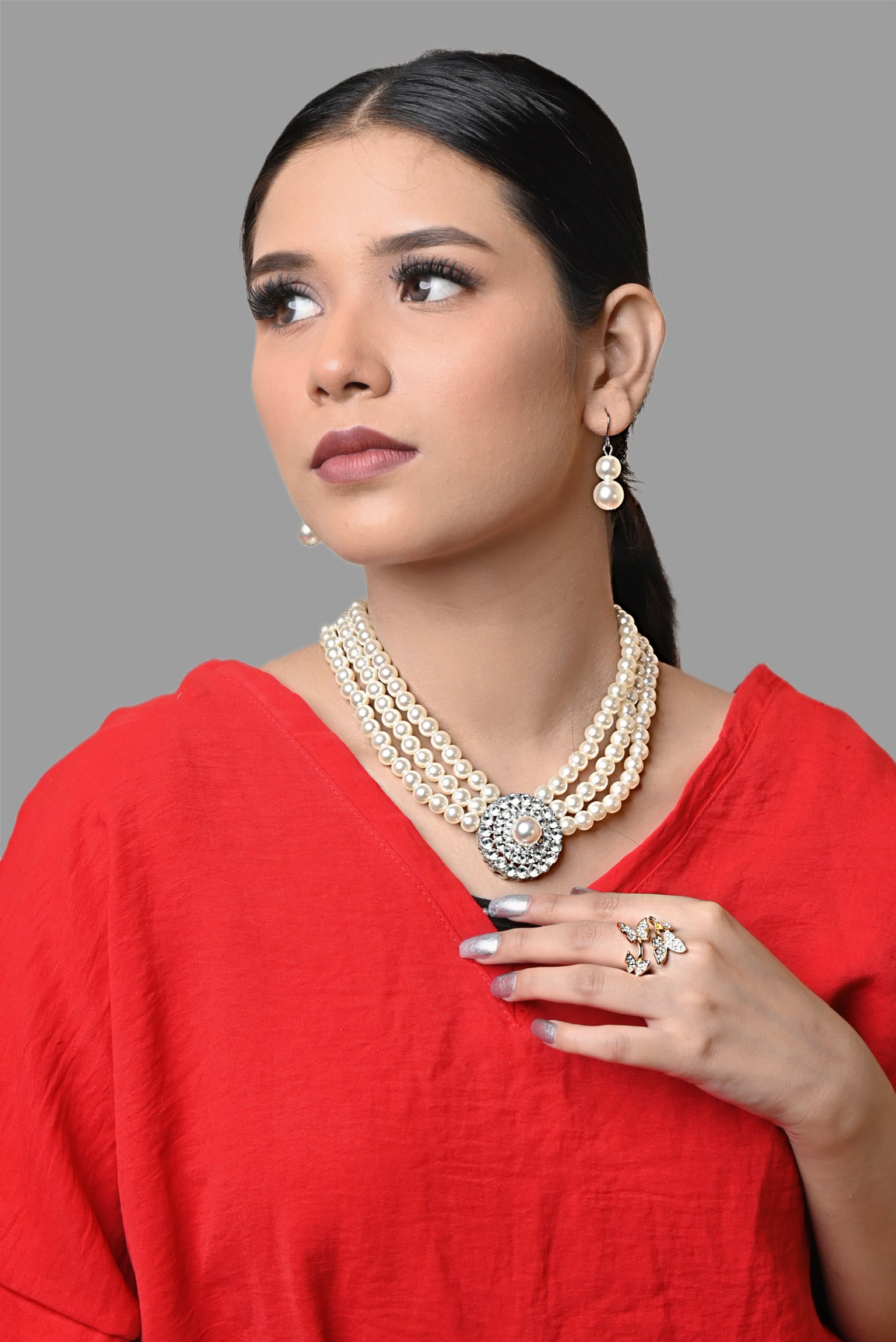Triple layered pearl neck set with earring