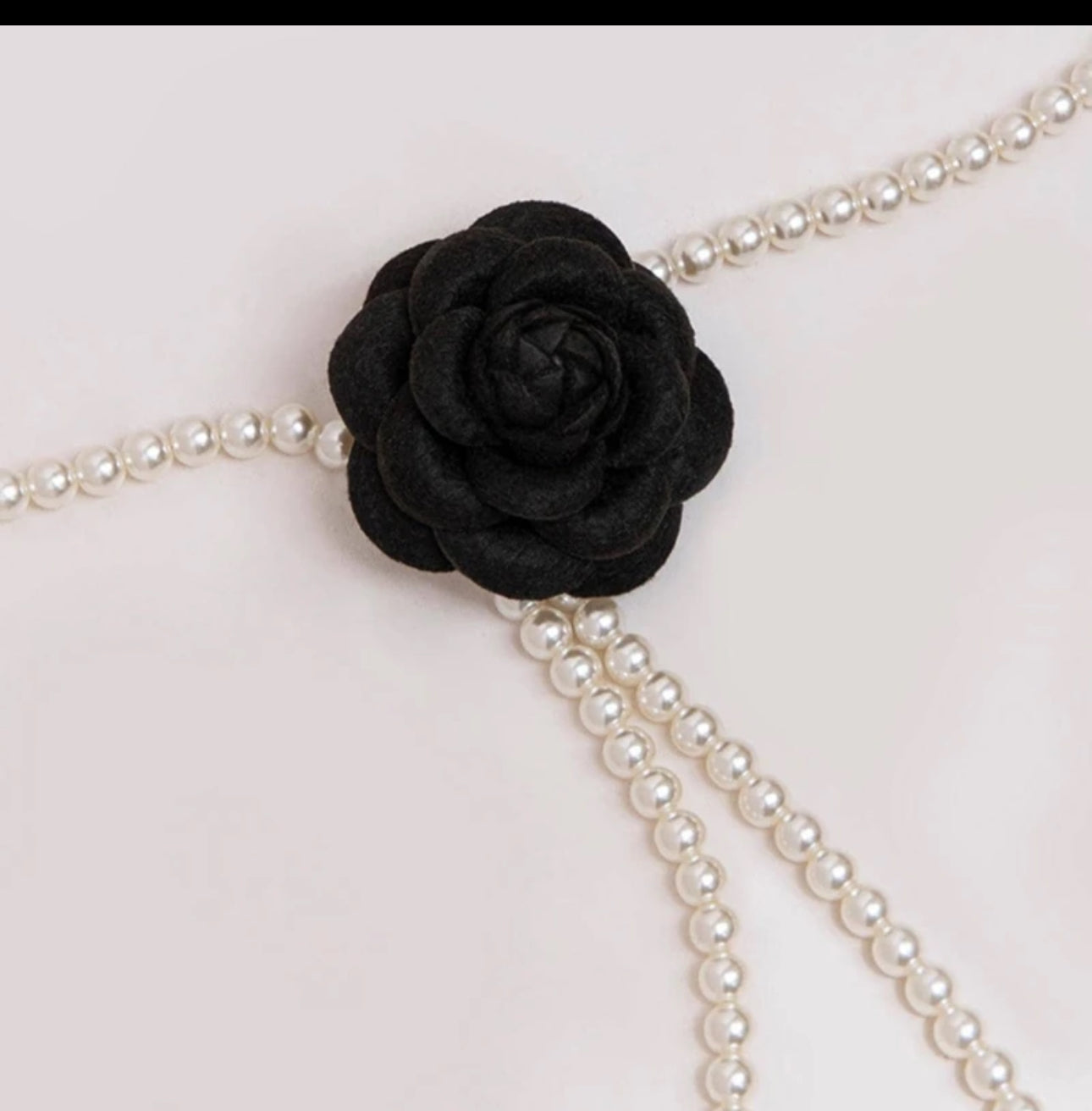 Pearl line with flower belt