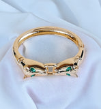 GOLD METAL ANIMAL HEAD BANGLE GREEN STONES