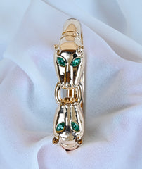 GOLD METAL ANIMAL HEAD BANGLE GREEN STONES